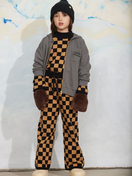 Grey zip-through hoodie with an embroidered Field Notes chest pocket, worn by a child in a checkered outfit.