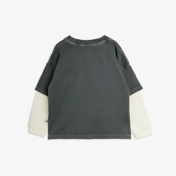 Grey long-sleeved t-shirt from behind featuring off-white layered sleeves and a ribbed neckline.