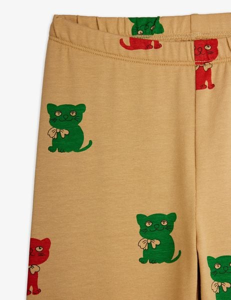 Beige leggings featuring a red and green Kittens print and an elasticated waistband.