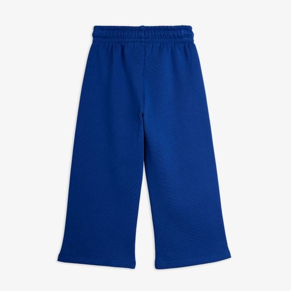 Blue wide-leg sweatpants with a gathered elastic waistband, shown from the back.