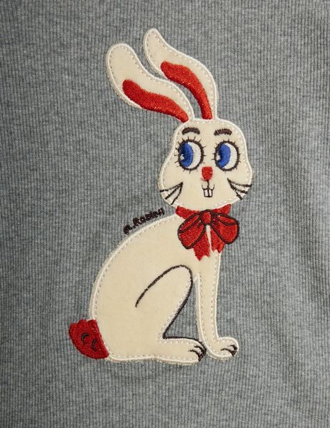 White embroidered rabbit application with a red bow on a grey melange bodysuit.