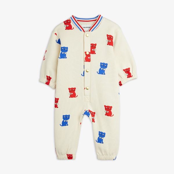 Off-white bodysuit with red and blue Kittens print, snap buttons and striped ribbed neckline.