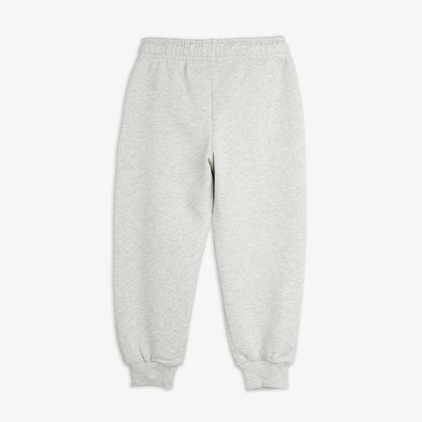 Grey melange sweatpants shown from the back featuring an elasticated waistband and ribbed cuffs.