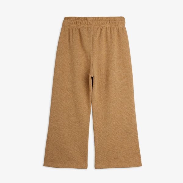 Brown melange organic cotton sweatpants with an elasticated waistband and wide legs, back view.