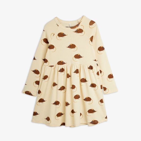 Beige long-sleeved dress featuring an all-over Elephant Shrew print, gathered waist, and flared skirt.