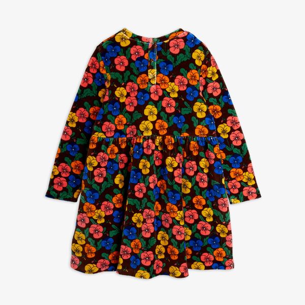 Long-sleeved velour dress with a colorful Violas flower print and flared skirt, shown from the back.