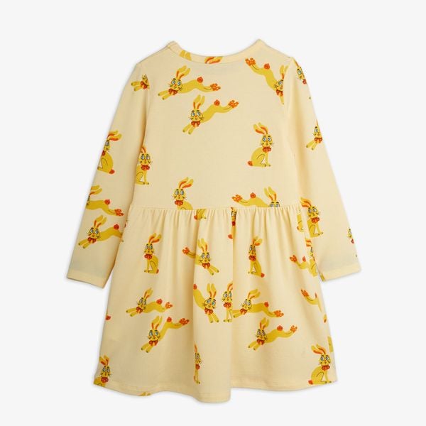 Yellow long-sleeved dress featuring an all-over Rabbits print and a gathered waist.