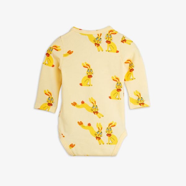 Yellow long-sleeve bodysuit featuring a Rabbits print with long sleeves.