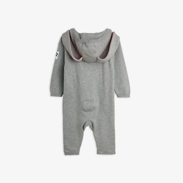 Grey melange knit baby jumpsuit with rabbit ears on the hood and a small round tail.