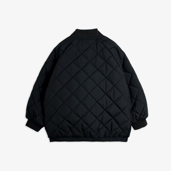 Black quilted puffer jacket featuring diamond stitching and ribbed trims, shown from the back.