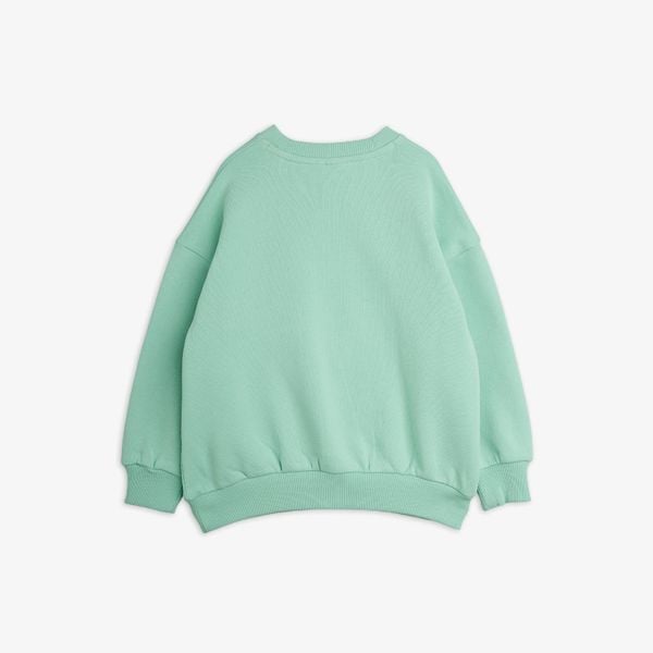 Mint green organic cotton sweatshirt with ribbed trims, shown from the back, part of Velvet worms observations collection.