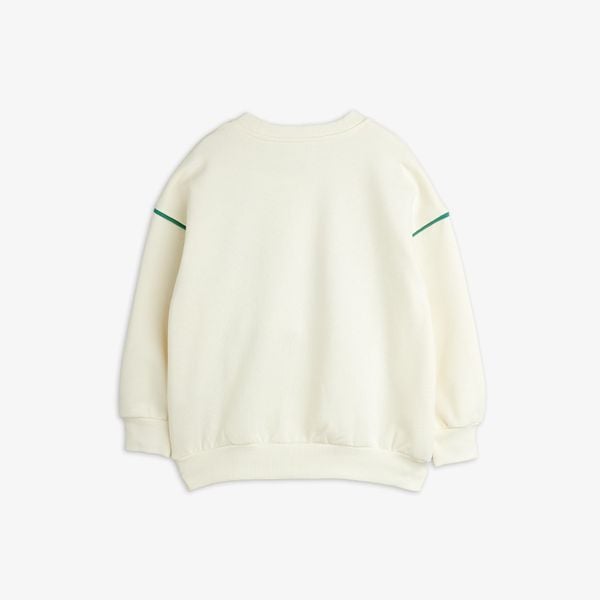 Off-white sweatshirt featuring a crew neck, ribbed trims, and green piping detail across the shoulders, shown from the back.