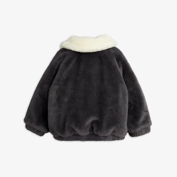 Grey faux fur aviator jacket with a contrasting white collar shown from the back.