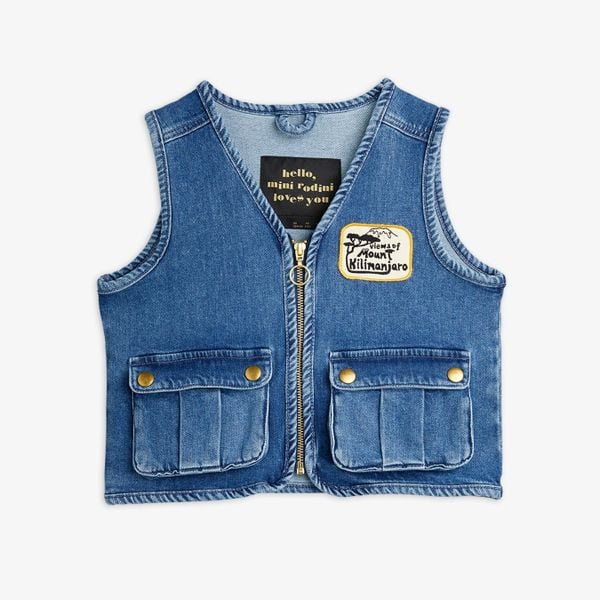 Denim utility vest with pockets and patches for kids, made from certified organic cotton.