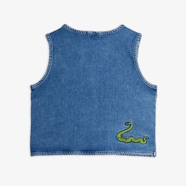 Denim utility vest with pockets and patches for kids, made from certified organic cotton.