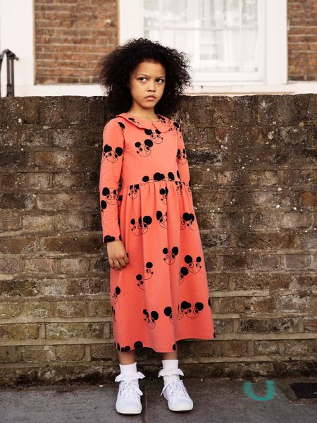 Red long-sleeve dress featuring a rounded collar and an all-over Ritzratz print.